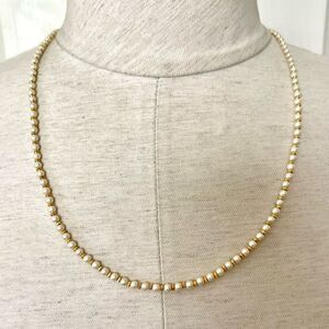 Dainty Pearl and gold tone necklace